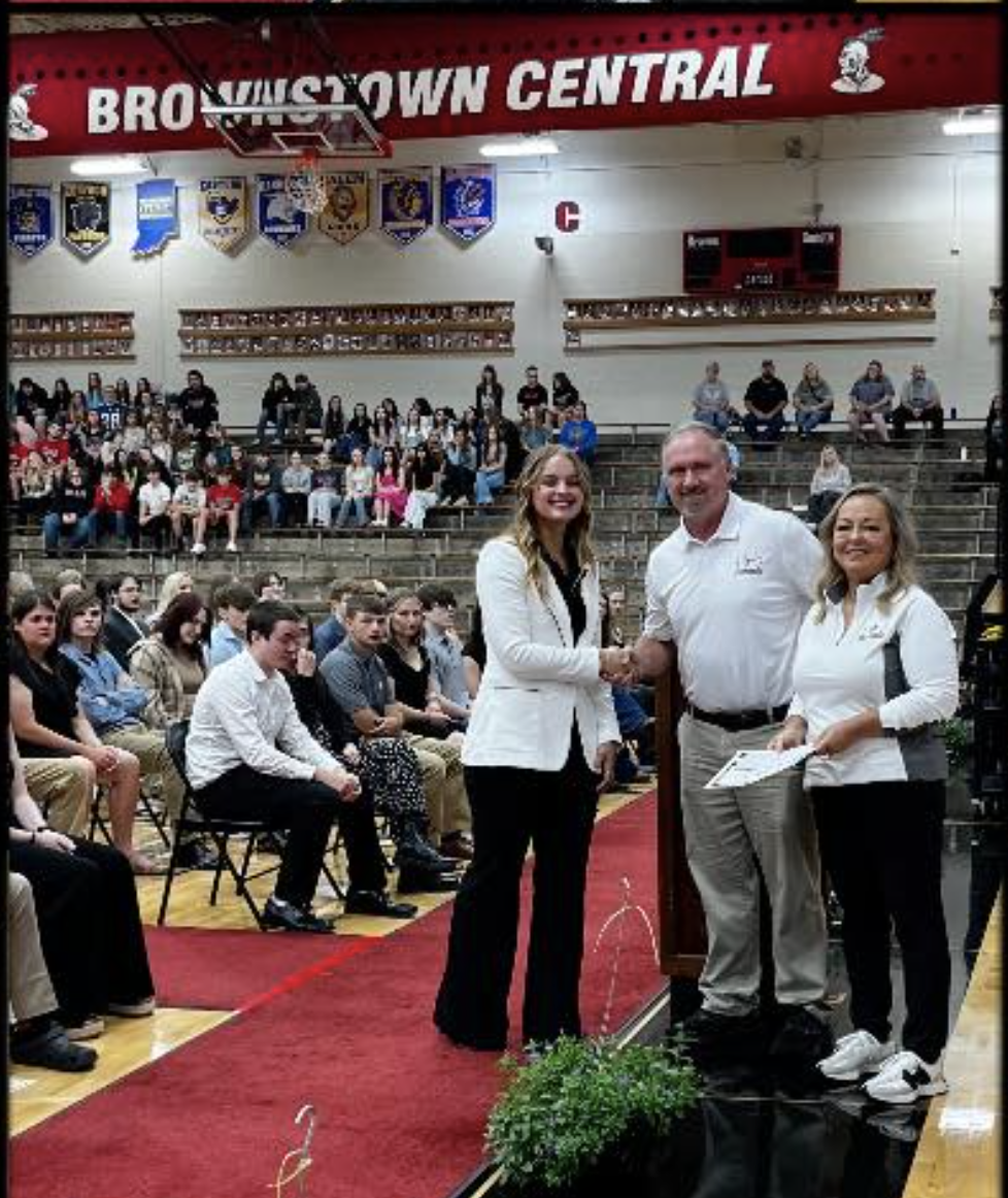 Brownstown student accepting scholarship.